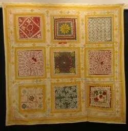 Water damage to red silk damask wall coverings